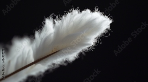 A high-speed capture of a cotton swab being gently rotated, showcasing its unique texture and design.