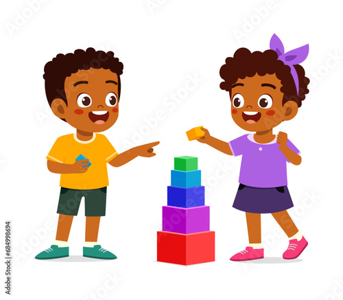 happy little kid play brick with friend