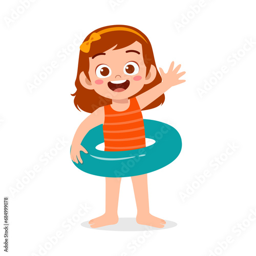 little kid using swim ring for swimming