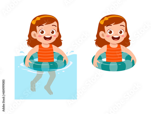 little kid using swim ring for swimming