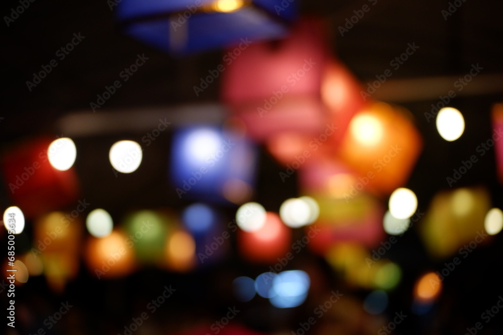 Abstract blur lights night in the city background. Festive background with LED lights garland. Christmas and New Year background.