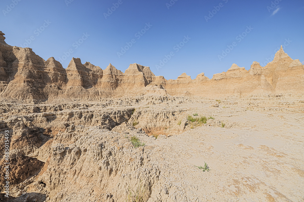 The Door Trail surrounded by eroded pinnacles in the Badlands National Park The Door Trail surrounded by eroded pinnacles in the Badlands National Park