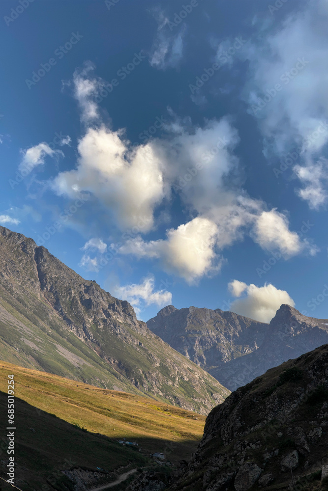 Mountain peaks in cloudy weather. View of the sky between two mountains. Shot in Rize elevit plateau