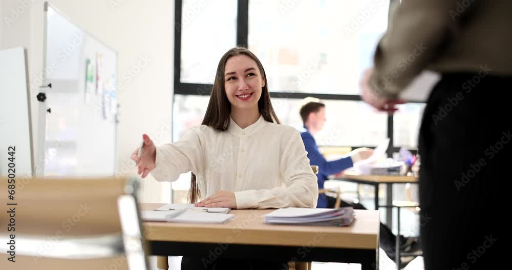 Women business partners meeting at table in office 4k movie slow motion. Cooperation and business consulting concept Women business partners meeting at table in office 4k movie slow motion. Cooperation and business consulting concept