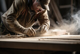 Carpenter Focused on Wood Sanding