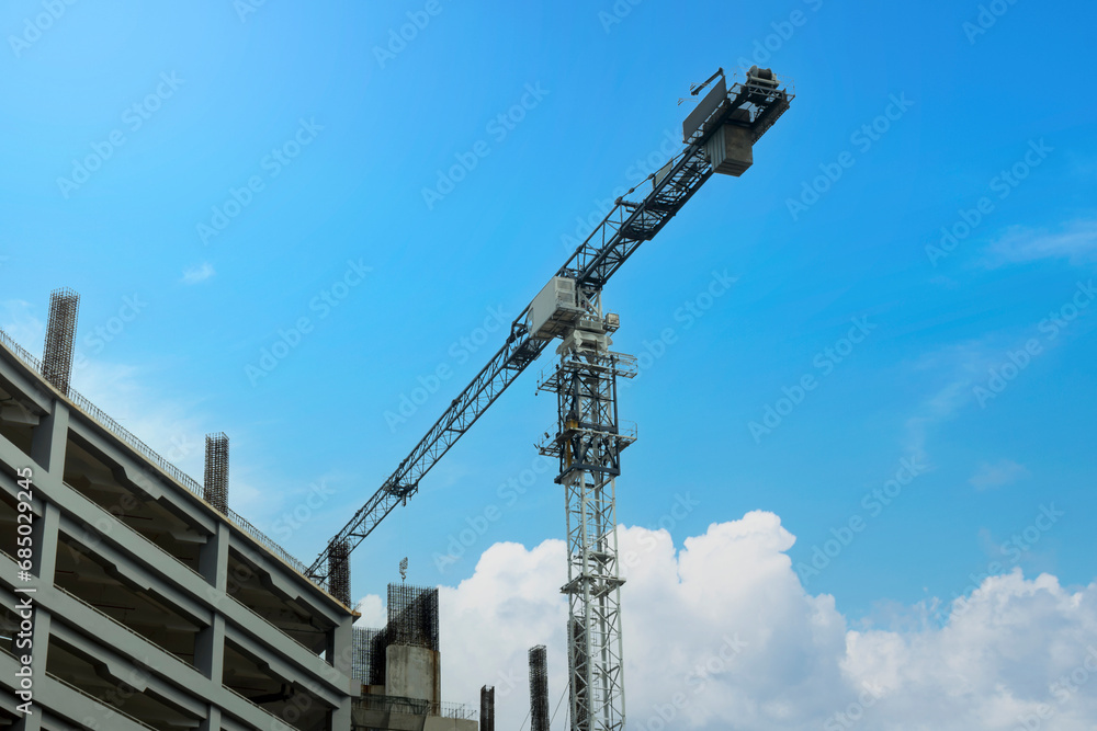 Crane on building construction site