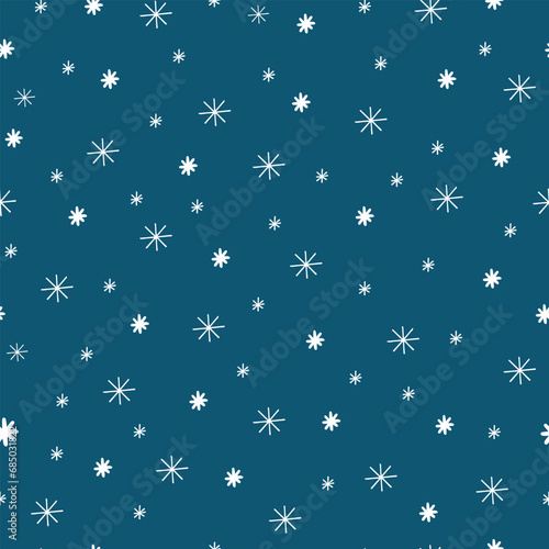 Seamless pattern with snowflakes on a dark turquoise background. Winter seamless background.