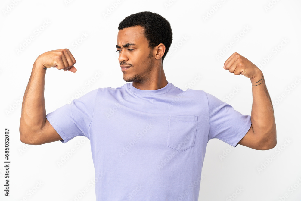 Fototapeta premium African American handsome man on isolated white background doing strong gesture