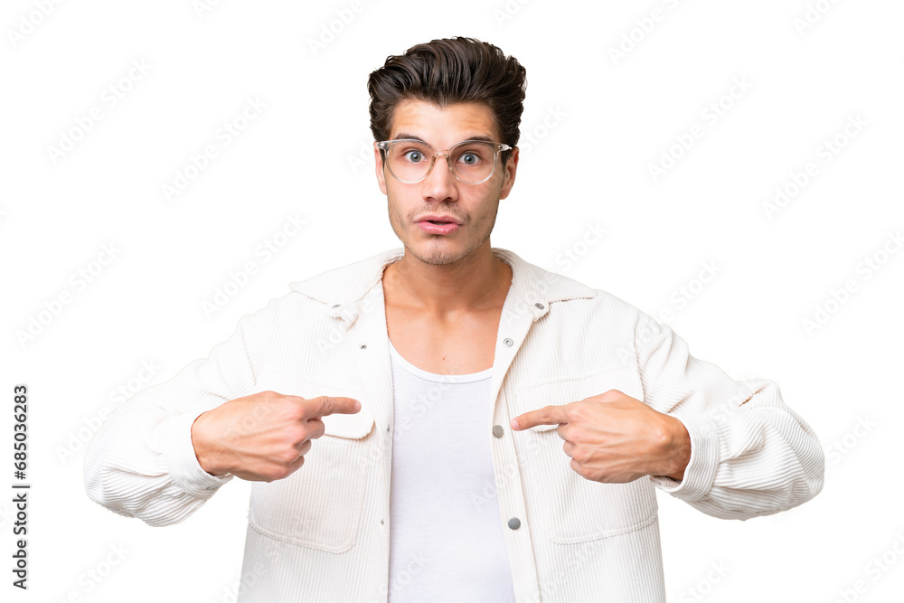 Young handsome caucasian man over isolated background pointing to oneself Young handsome caucasian man over isolated background pointing to oneself