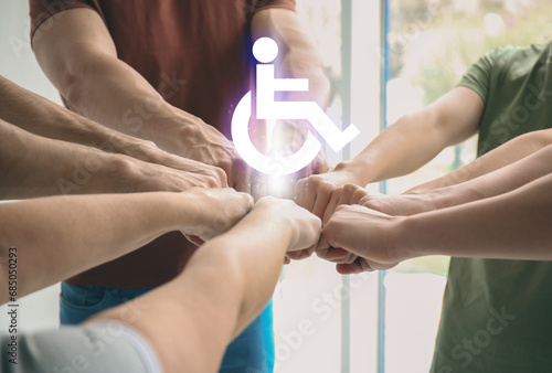Inclusion concept. International symbol of access. People holding hands together, closeup photo