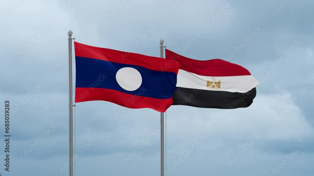 Egypt flag and Laos flag waving together on cloudy sky, endless seamless loop, two country relations concept Egypt flag and Laos flag waving together on cloudy sky, endless seamless loop, two country relations concept