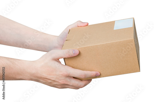 Hand holding parcel box isolated on white background. © Pornprasit Panada