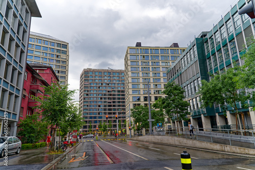 Storage street with modern buildings at Swiss City of Zürich on a rainy summer day. Photo taken July 12th, 2023, Zurich, Switzerland.