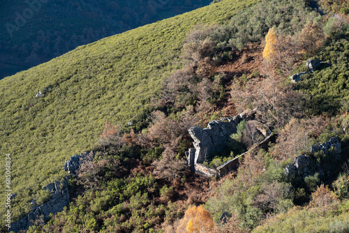 Cortín or Alvariza, construction to protect bee hives from the bear in northern Spain, Ancares, Lugo photo