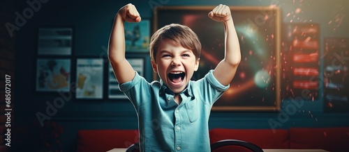 Joyful young student standi...
