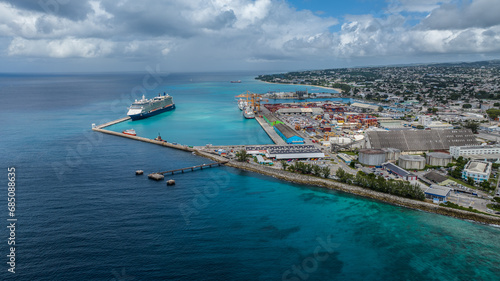 aerial landscape view of area around the port of Bridgetown, Barbados, a multipurpose seaport with a cruise ship and two vessels moored  © Mario Hagen