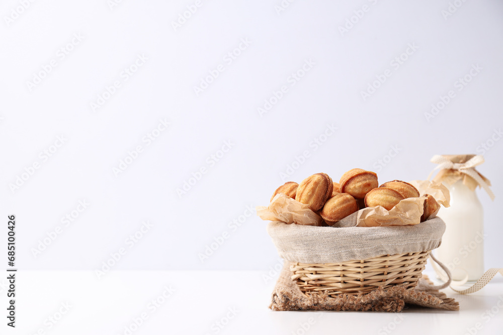 Nut cookies in a flying bowl on a white background Nut cookies in a flying bowl on a white background