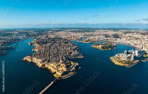 Fototapeta Naklejka Na Ścianę i Meble -  Valletta City in Malta Aerial Drone Photography. A drone's perspective captures the historic grandeur and coastal charm