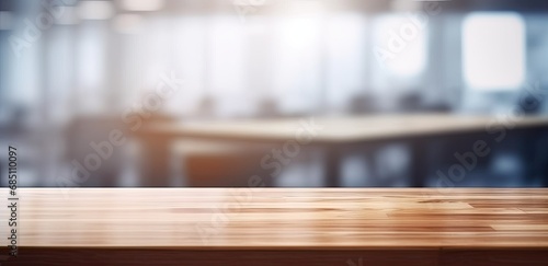 Minimalist workspace. Empty wooden desk or table in bright room perfect for creating clean and modern background for product displays design mockups for interior design concepts