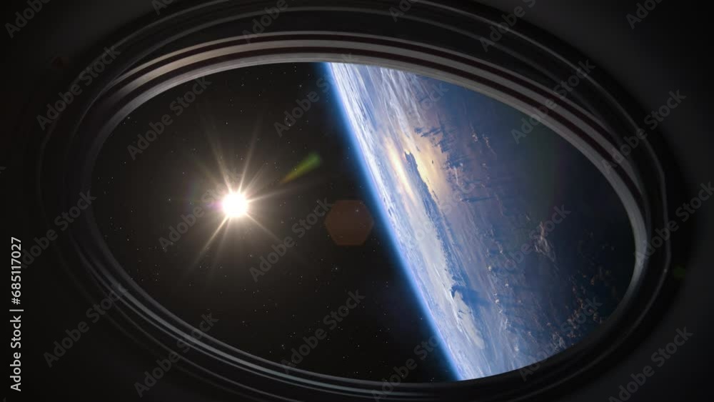 Spacecraft flies near the amazing blue planet Earth, view from the porthole. Planet Earth and Sun as viewed through the windows of a ISS. Elements of this video furnished by NASA. Spacecraft flies near the amazing blue planet Earth, view from the porthole. Planet Earth and Sun as viewed through the windows of a ISS. Elements of this video furnished by NASA.