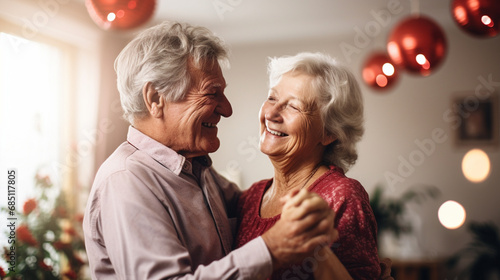 An elderly couple dancing in their living room to an old love song, Valentine’s Day, elderly couple, bokeh, with copy space © Катерина Євтехова