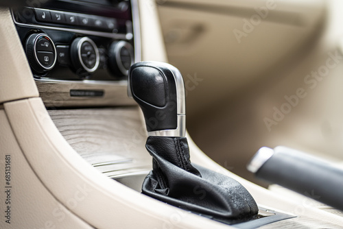 Car inside. Interior of prestige modern car. Comfortable leather seats. Black cockpit with on isolated white background.