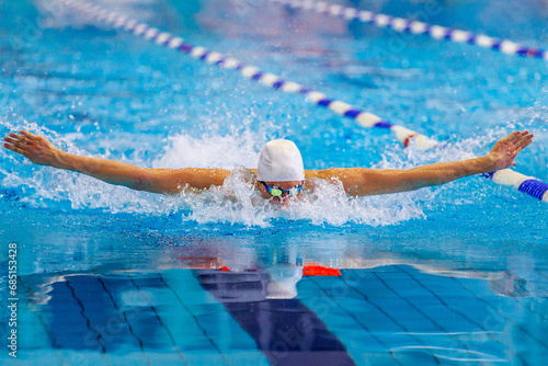 athlete swimmer swim butterfly stroke competition race, summer sports games photo