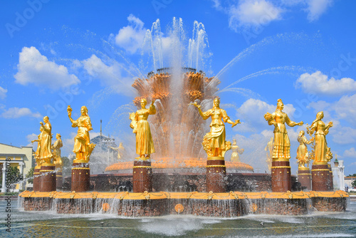 Golden statues of the Friendship of Peoples fountain in VDNKh park