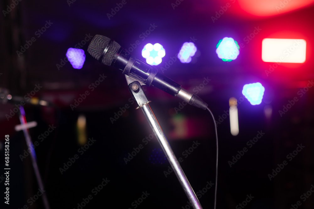 Obraz premium microphone on stage with spotlight