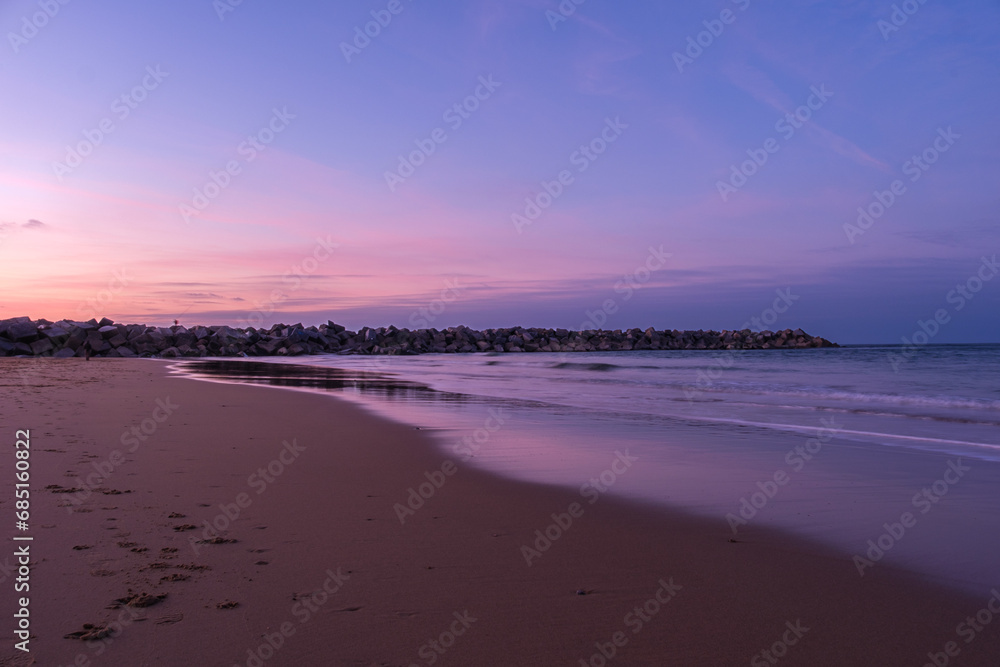 The Zurriola beach of San Sebastian, Spain at Sunset
