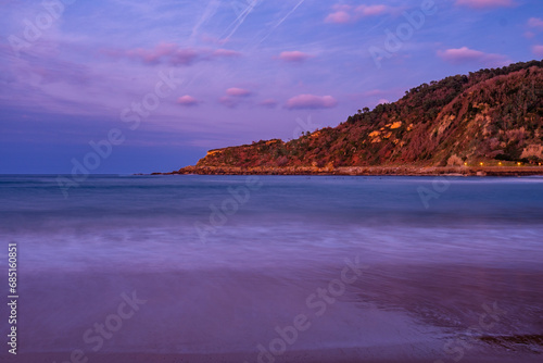 The Zurriola beach of San Sebastian, Spain at Sunset