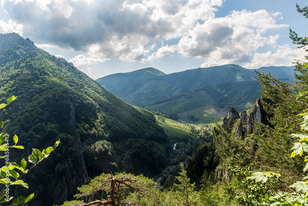 View from Zbojnicky chodnik hiking trail above Vratna valley in Mala Fatra mountains in Slovakia - obrazy, fototapety, plakaty 