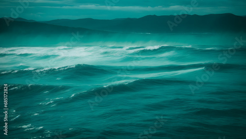 Underwater-themed image featuring turquoise-colored ripples and waves against a dark backdrop, resembling the tranquility of an ocean scene.