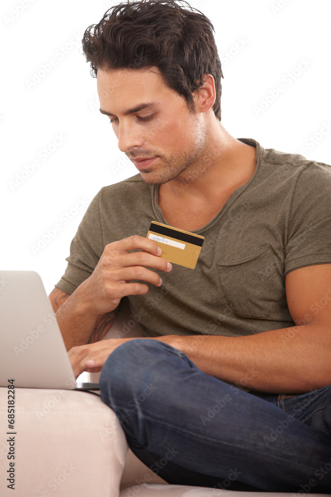 Laptop, credit card and relax with man on sofa for online shopping, digital payment and fintech. Ecommerce, banking and bills with male customer in living room of home for technology and web Laptop, credit card and relax with man on sofa for online shopping, digital payment and fintech. Ecommerce, banking and bills with male customer in living room of home for technology and web