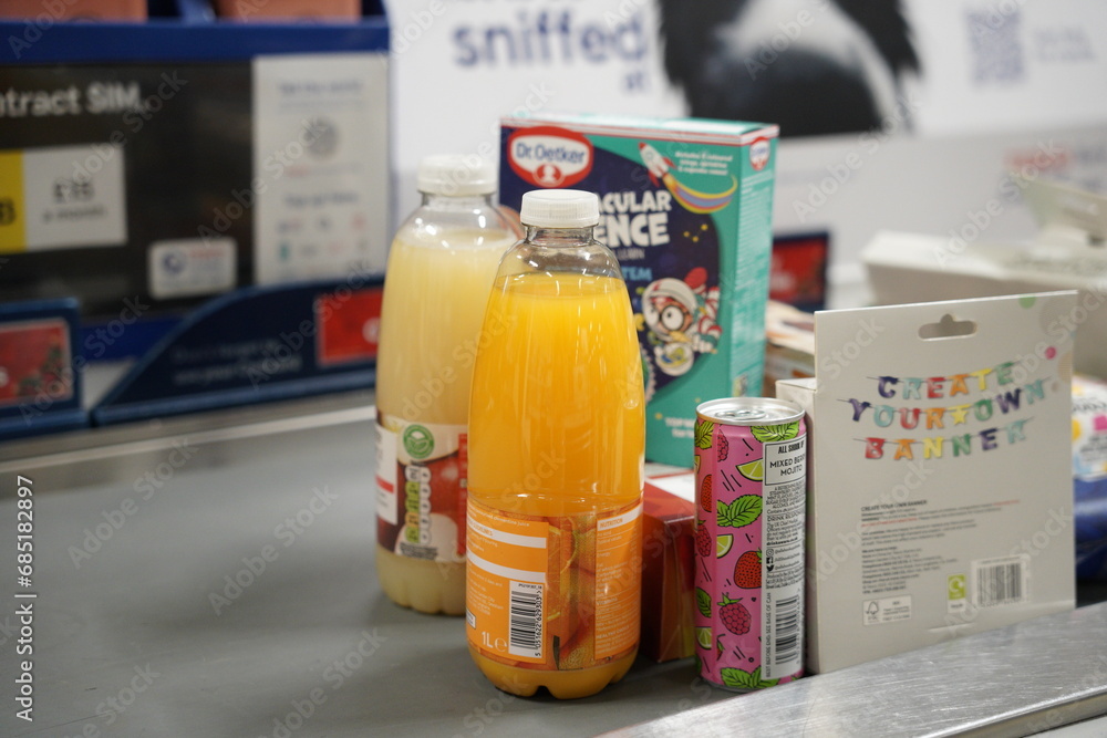 Various groceries from Tesco. juice, soft drinks, cake mixer and