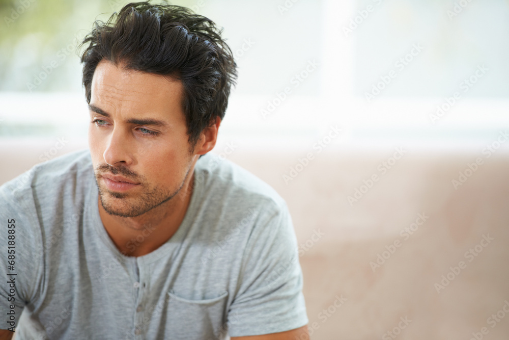 Man, thinking and sofa for sad in home or lonely grief mourning, broken heart or stress. Male person, unhappy thoughts on couch for depressed risk or loss problem from anxiety, mental health or fail Man, thinking and sofa for sad in home or lonely grief mourning, broken heart or stress. Male person, unhappy thoughts on couch for depressed risk or loss problem from anxiety, mental health or fail