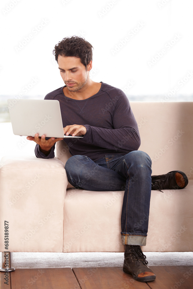 Man, work from home and typing on computer for stock market investment, planning and research with website on sofa. Startup freelancer or trader on a couch, laptop and trading software for analysis Man, work from home and typing on computer for stock market investment, planning and research with website on sofa. Startup freelancer or trader on a couch, laptop and trading software for analysis