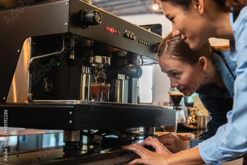 woman baristas follow recipes to create artisan and specialty beverages.Small business owners practice the sense of taste