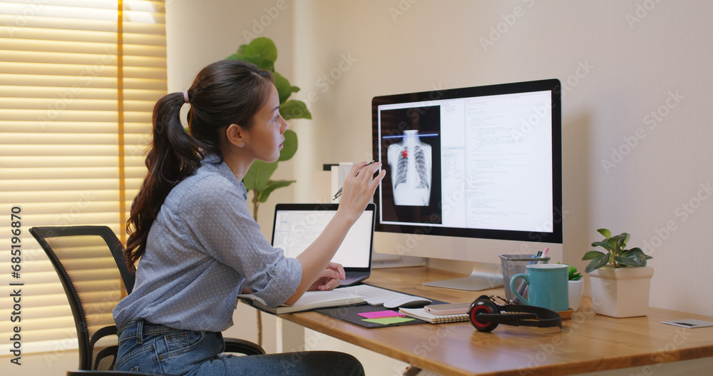 Clinical coder programmer improve future patient care service. Medtech big data tool developer automatic IT software lung X-ray covid analyze cloud computing typing python check code at home office.