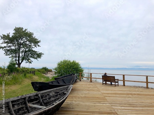 view on the lake and old boats