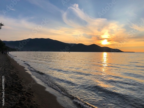 silence and calm in the evening on the beach of Lake Baikal