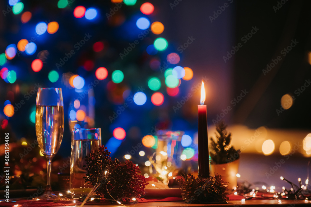 No people shot of decorated holiday table showcasing cozy atmosphere of Christmas and New Year Eve No people shot of decorated holiday table showcasing cozy atmosphere of Christmas and New Year Eve