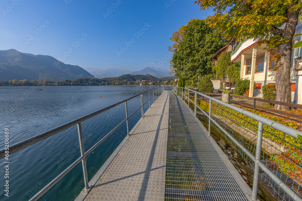 Obraz premium View of the big lake of Avigliana (Lago Grande), in the province of Turin, Piedmont, Italy