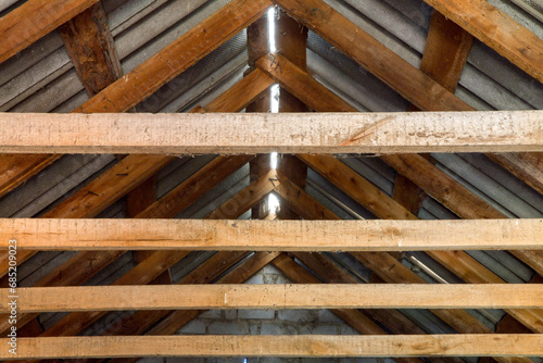 Wooden roof structure of a country house.