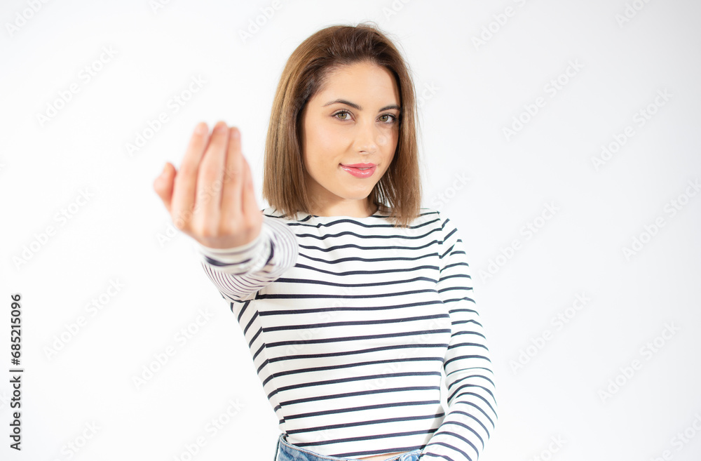 Young woman over isolated white background inviting to come with hand. Happy that you came Young woman over isolated white background inviting to come with hand. Happy that you came