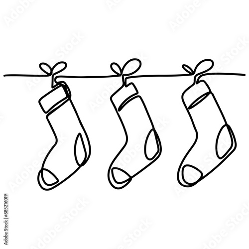 Christmas socks garland in single line style. One continuous line drawing. Vector illustration isolated on white background.