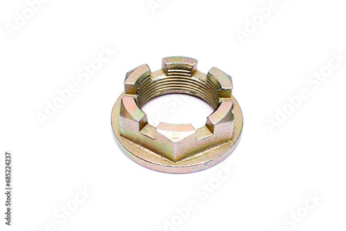 Car castellated nut isolated on white background. New spare parts.