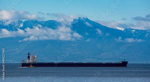 Ship sailing in the Juan de Fuca Strait Between Canada and USA photo