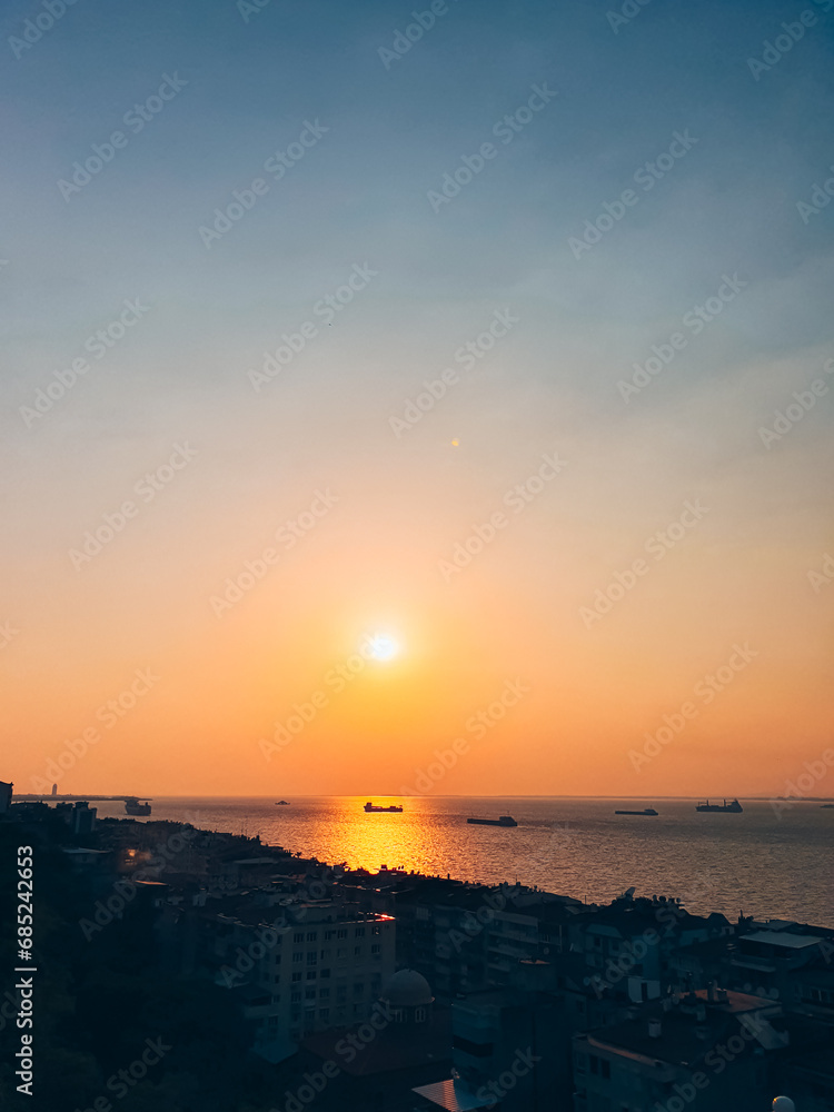 Apartment buildings on the shore of Aegean Sea during the sunset, Izmir, Turkey