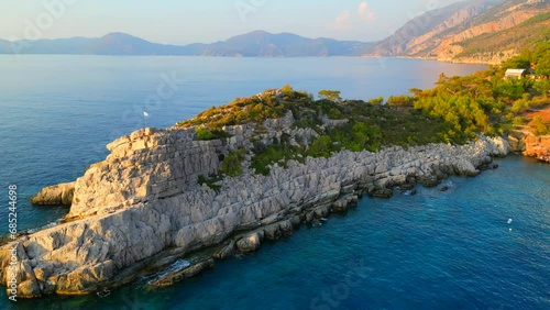 Aerial shot of rocky coastline in mediterranean sea.